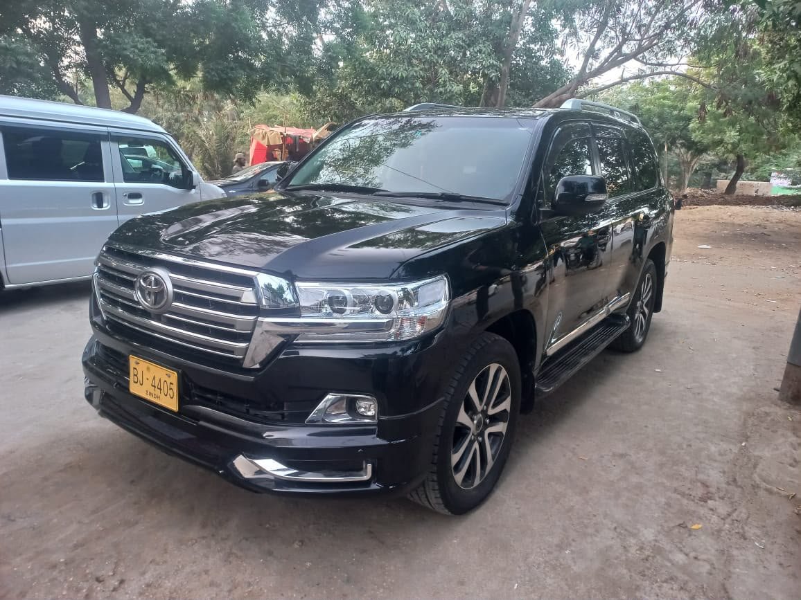 HB Travels rental vehicle on the road in Lahore and Islamabad